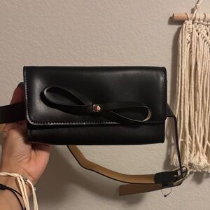 Sleek Black Leather Clutch with Bow Accent